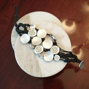 Silver tone string bracelet